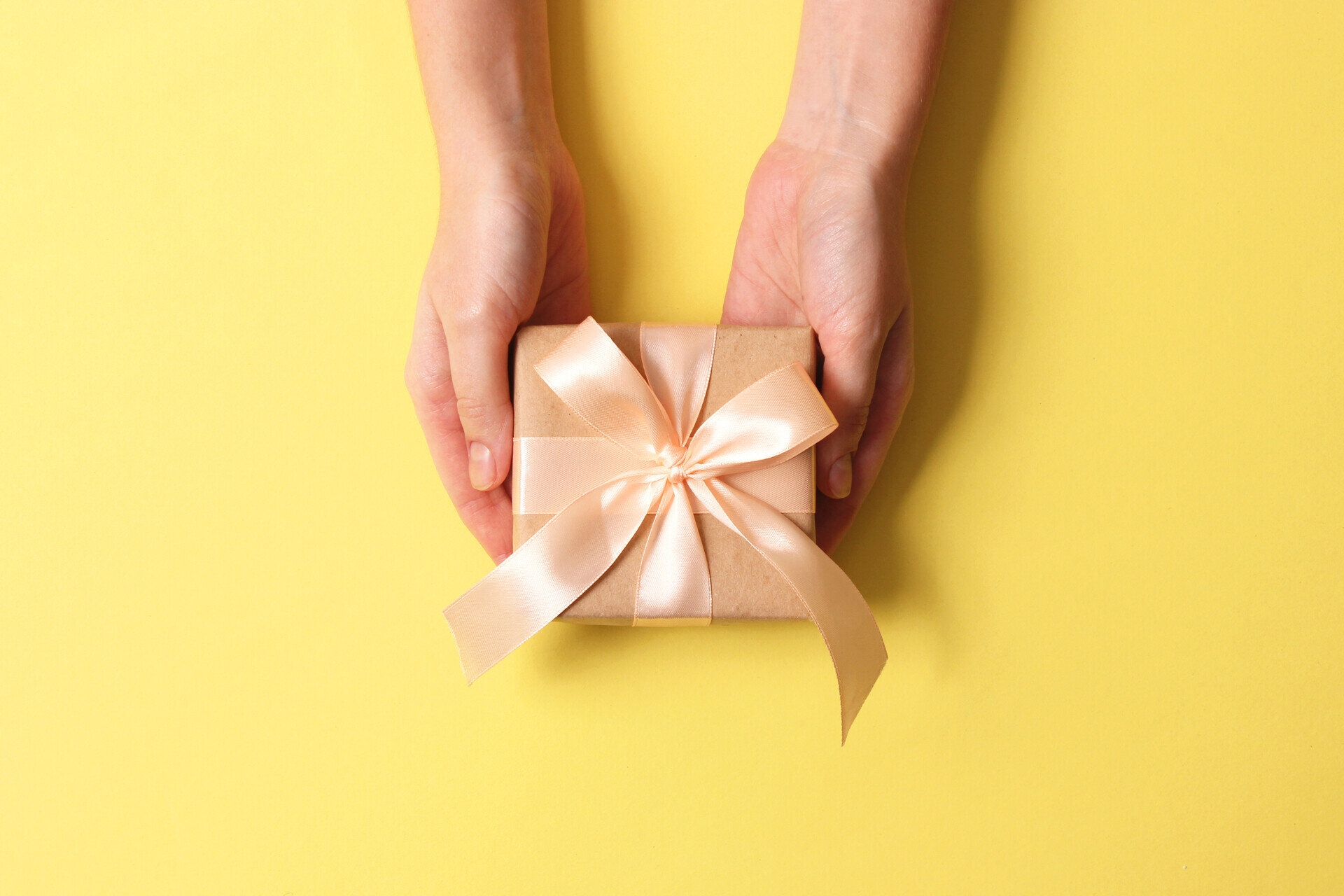 Hands holding gift